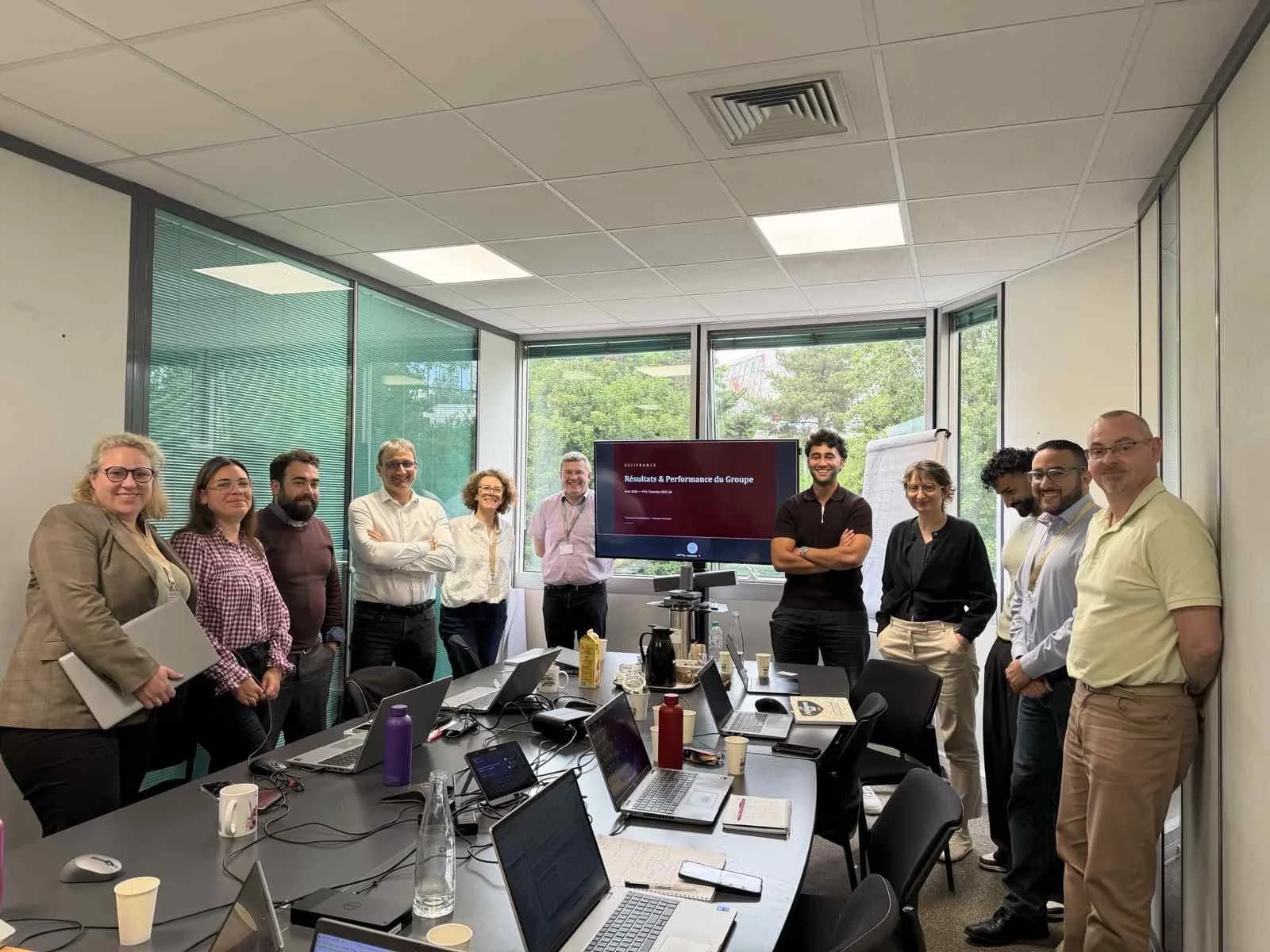 Équipe finance Délifrance réunie en salle pendant une formation IA animée par AI Makers